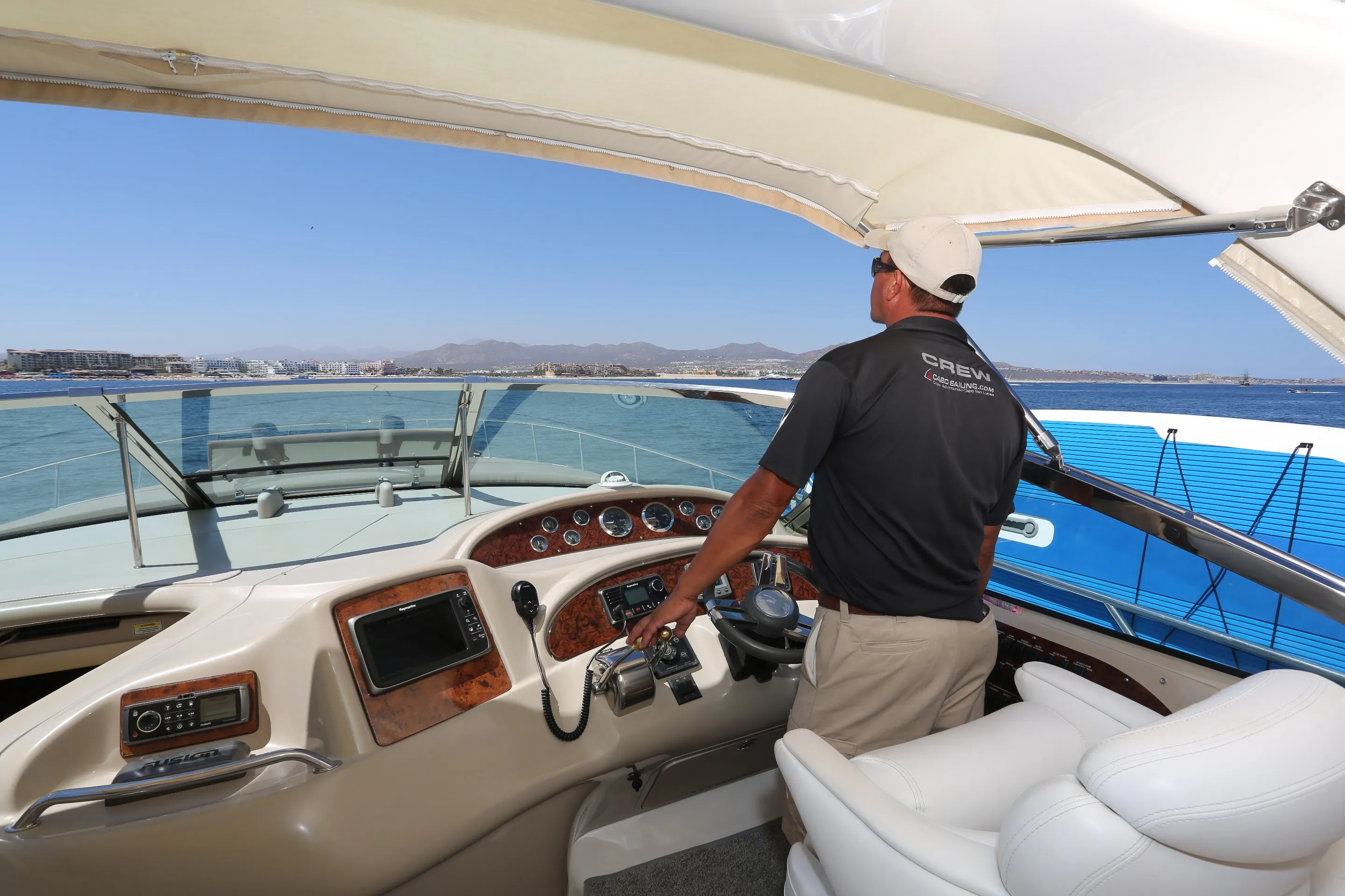 Captain aboard our 51' luxury sailing yacht in Cabo San Lucas