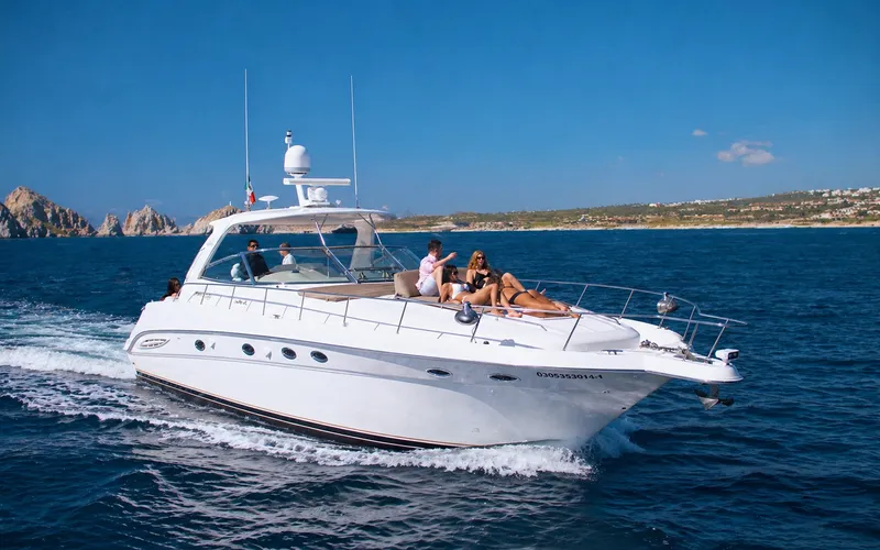 Luxury yacht rental Cabo San Lucas cruising the coastline