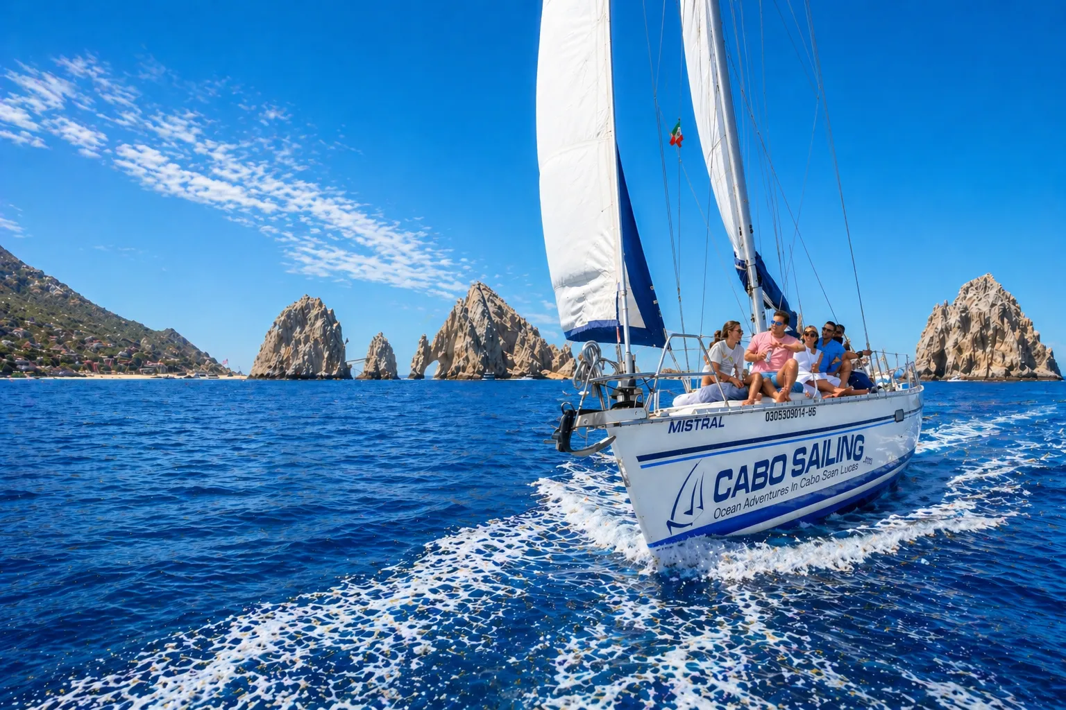 Sailing near Cabo's rocky coastline